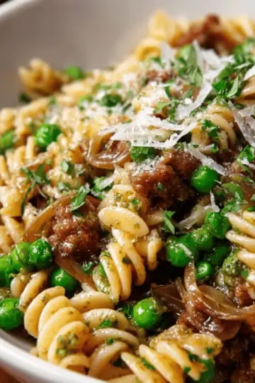Sausage Pesto Pasta with Caramelized Onions and Peas